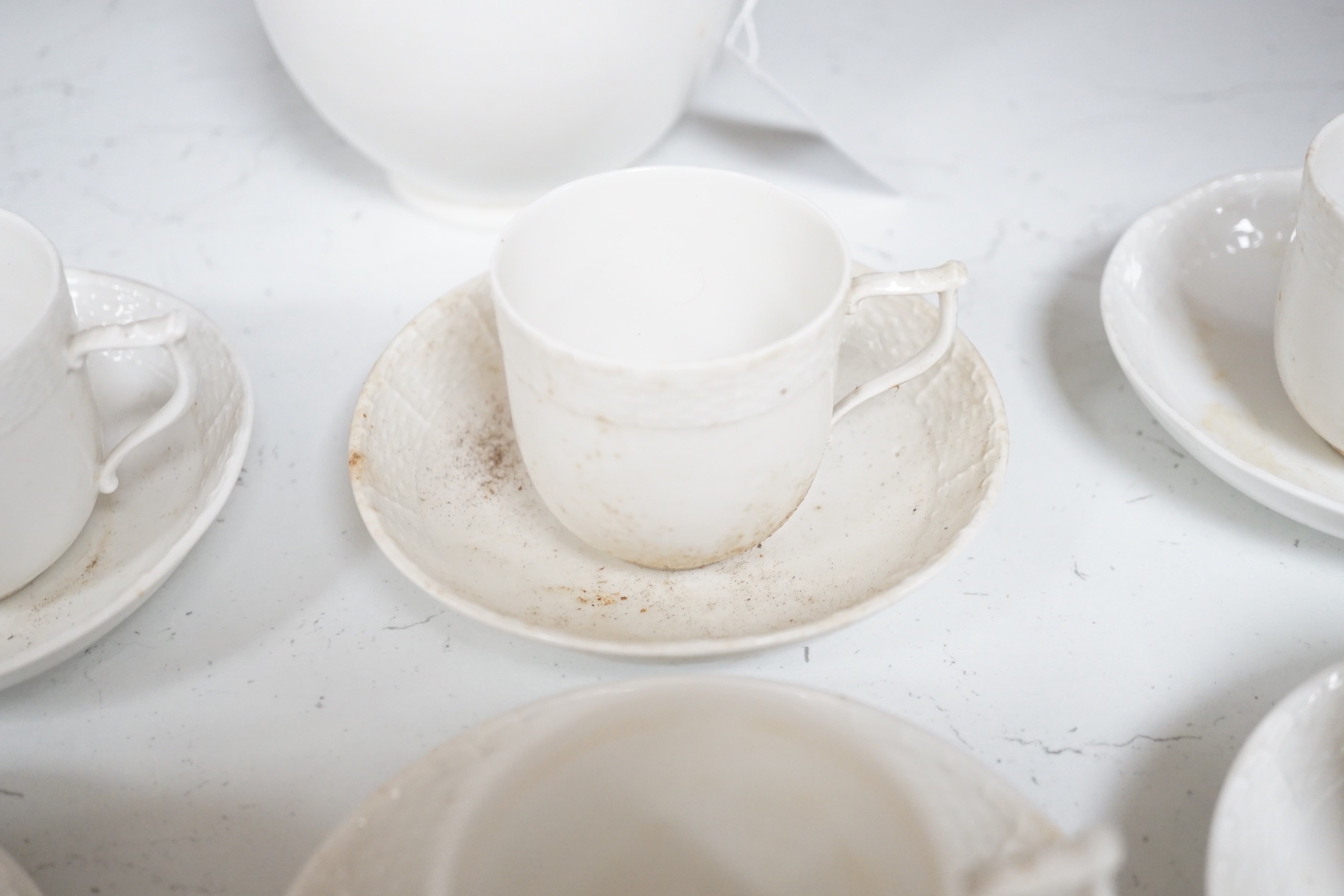 An early 20th century Berlin white glazed porcelain coffee set, tallest 21cm